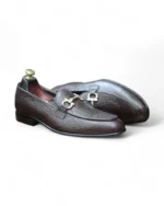 Side profile of Men's Brown Anaconda Snake Print Penny Loafers with horse bit accent and durable construction