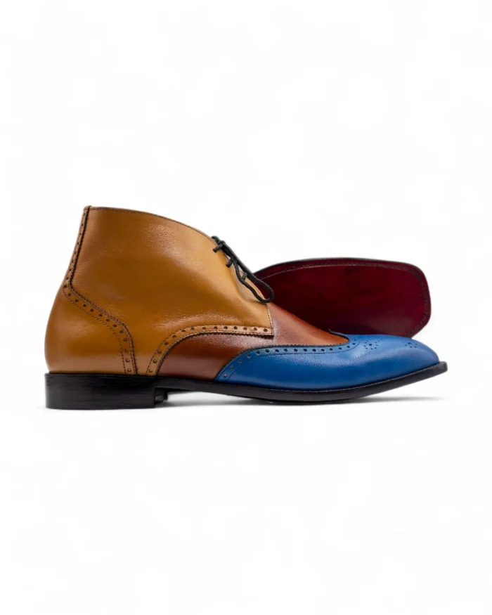 IMG_9049 "Back view of Men’s Three-Tone Wingtip Chukka Boots by Leather Edges, highlighting the sleek handcrafted finish.