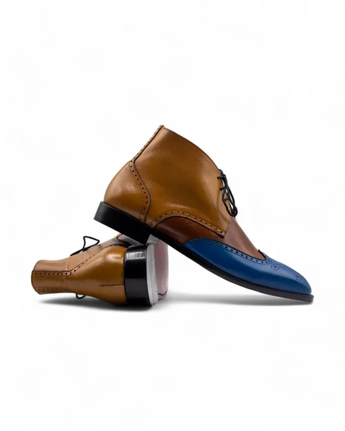 Men’s Three-Tone Wingtip Chukka Boots by Leather Edges, showcasing a handcrafted leather upper with intricate wingtip detailing.