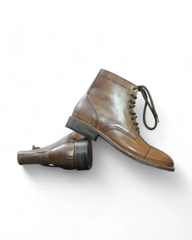 Rear view of Men’s Cap-Toe Oxford Dress Boot with goat leather lining.
